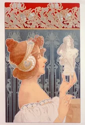 Frau hält eine Statuette